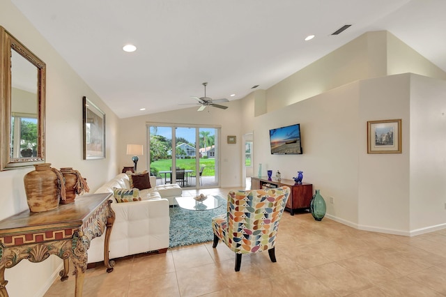 tiled living room with ceiling fan and vaulted ceiling