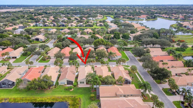 birds eye view of property featuring a water view