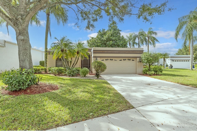 single story home with a front lawn and a garage