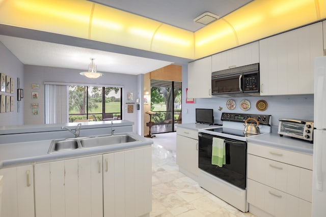 kitchen with tasteful backsplash, sink, decorative light fixtures, white cabinets, and white range with electric cooktop