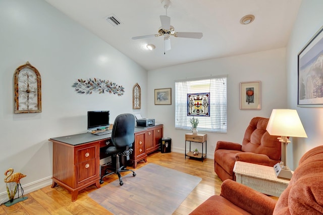 office area featuring ceiling fan, light hardwood / wood-style floors, and vaulted ceiling