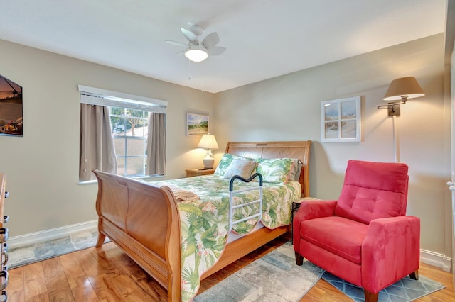 bedroom featuring ceiling fan and light wood-type flooring