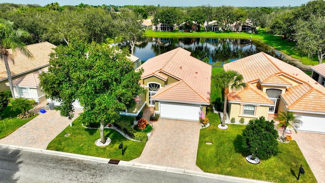 bird's eye view with a water view