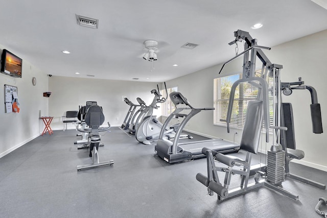 exercise room with ceiling fan