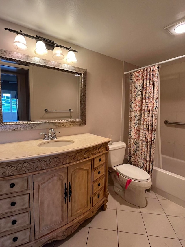 full bathroom featuring toilet, shower / bath combination with curtain, vanity, and tile patterned floors