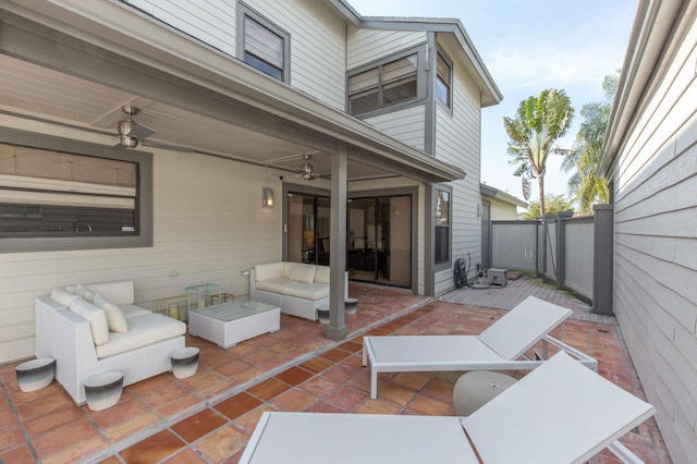 view of patio / terrace with an outdoor living space and ceiling fan