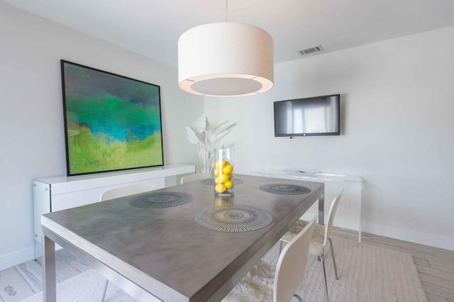 dining room featuring light hardwood / wood-style floors