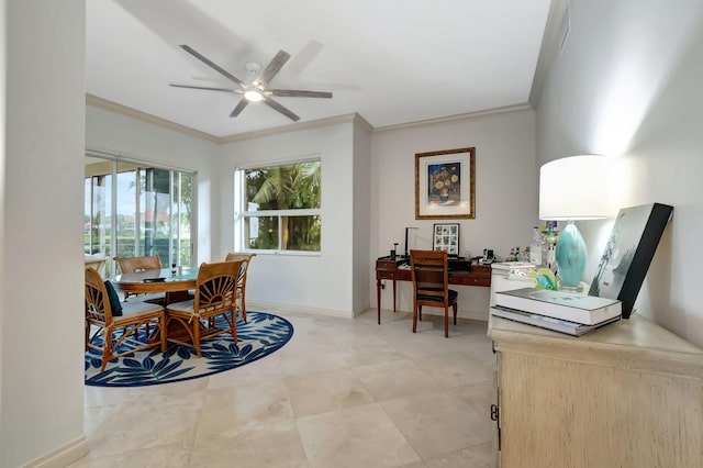 dining area featuring crown molding and ceiling fan