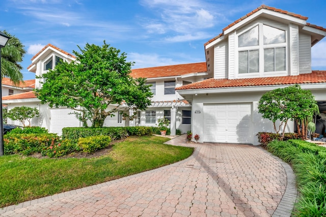 view of front of property with a garage