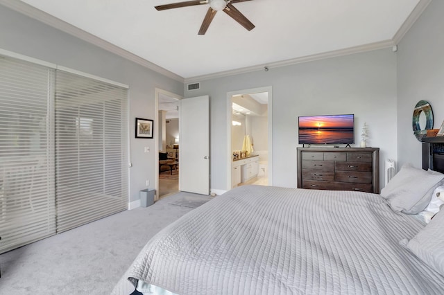 bedroom with ensuite bath, ceiling fan, light carpet, and ornamental molding