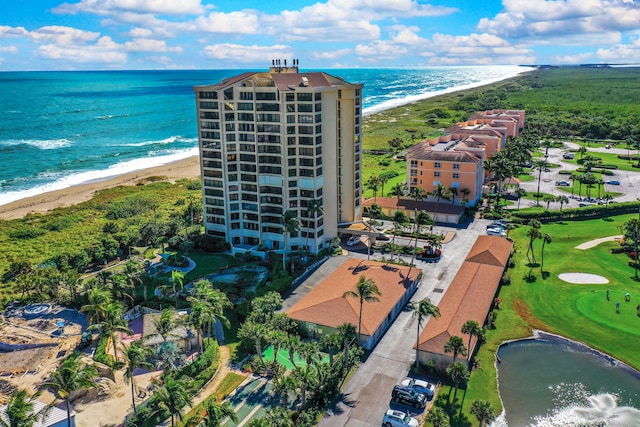 aerial view featuring a beach view and a water view