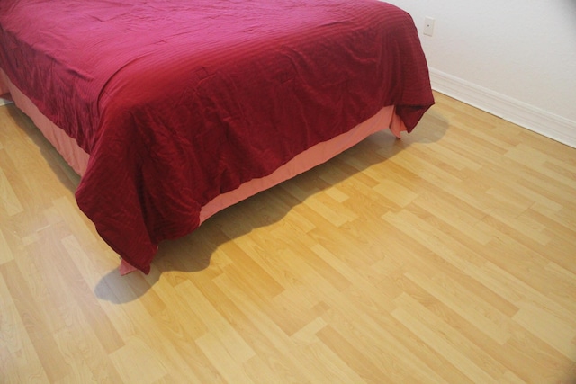 bedroom with light hardwood / wood-style flooring