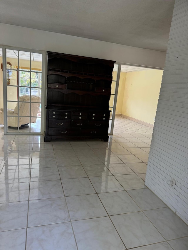 view of tiled spare room