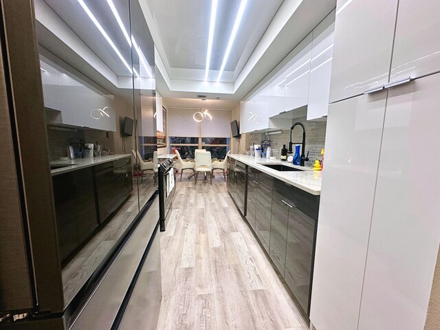 dining room with wood-type flooring