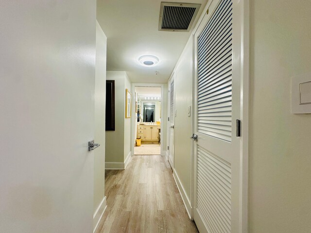 hallway featuring light hardwood / wood-style flooring