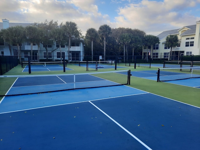 view of sport court featuring basketball hoop