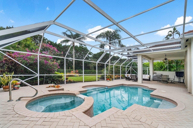 view of pool with a patio area, an outdoor living space, an in ground hot tub, and glass enclosure