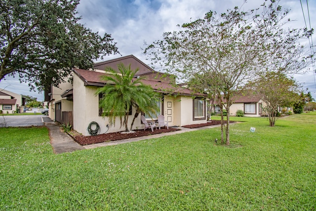 view of front of house with a front yard