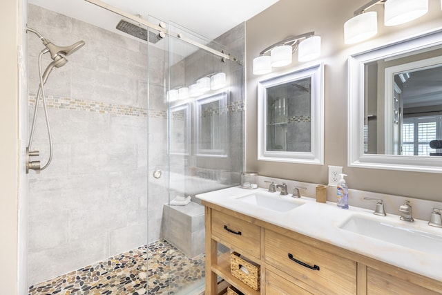 bathroom featuring vanity and a tile shower