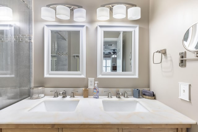 bathroom with ceiling fan and vanity