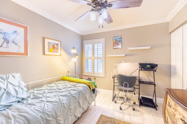 bedroom with a closet, ornamental molding, and ceiling fan