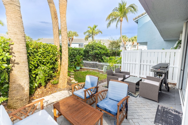 view of patio featuring outdoor lounge area and grilling area