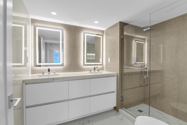 bathroom with vanity, toilet, and walk in shower