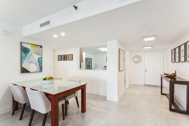 view of tiled dining space