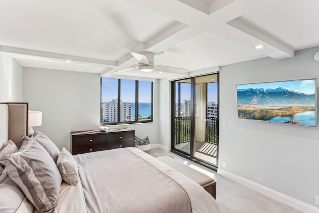 bedroom with light carpet, access to exterior, beamed ceiling, and a water view