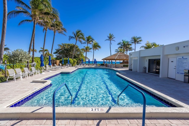 view of pool with a patio and a gazebo