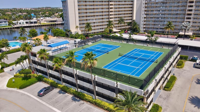 birds eye view of property with a water view