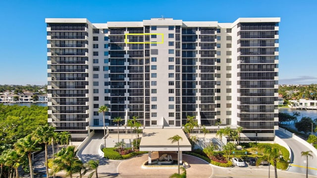 view of building exterior with a water view