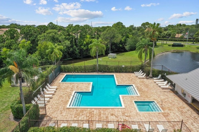 view of pool with a water view