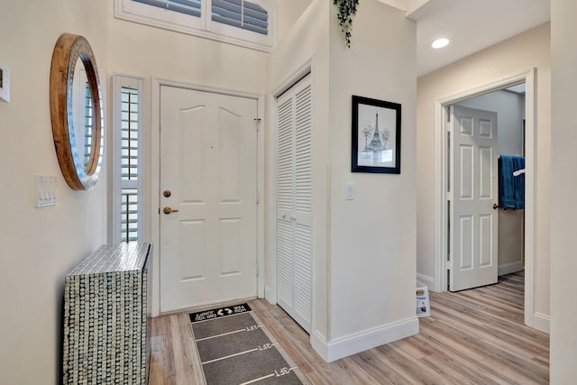 entrance foyer with light hardwood / wood-style flooring