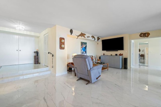 1900 Consulate Pl Unit 1702, West Palm Beach, FL 33401 - living area featuring light marble finish flooring