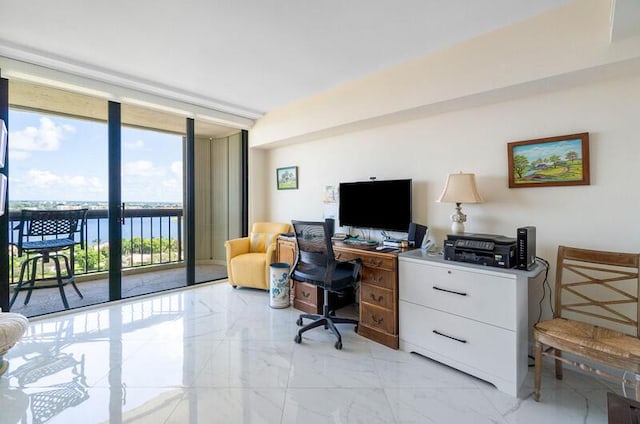 1900 Consulate Pl Unit 1702, West Palm Beach, FL 33401 - home office featuring light marble finish floors and floor to ceiling windows