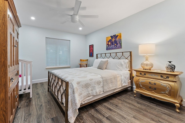 bedroom featuring dark hardwood / wood-style floors and ceiling fan