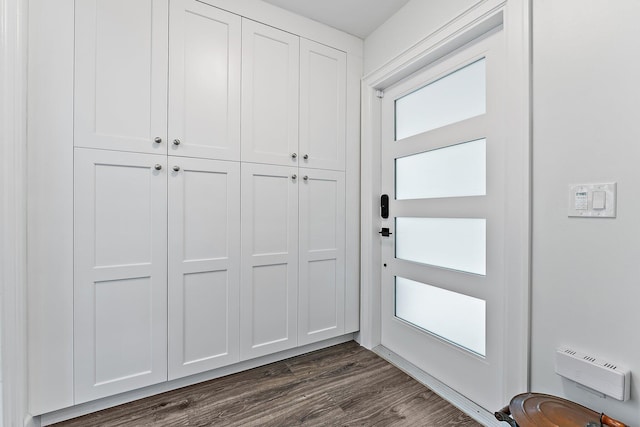 doorway to outside featuring dark hardwood / wood-style flooring