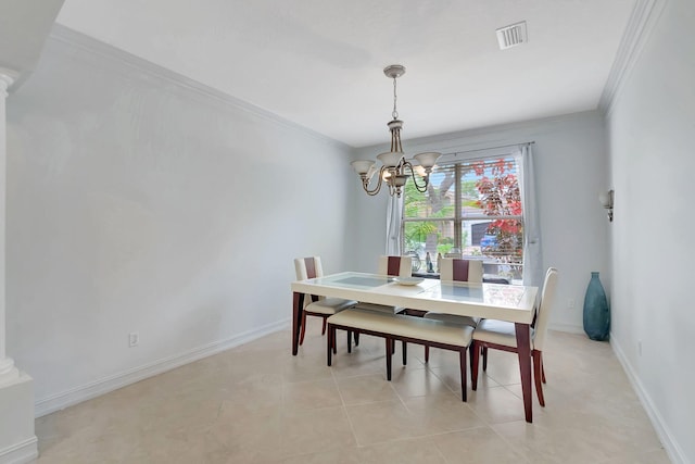 dining room featuring a chandelier, light tile patterned floors, and crown molding