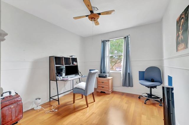 home office with ceiling fan and wood-type flooring