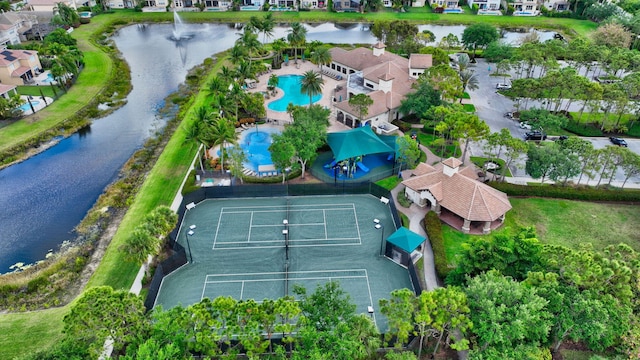 birds eye view of property featuring a water view