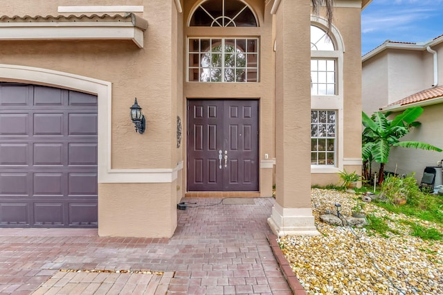 entrance to property with a garage