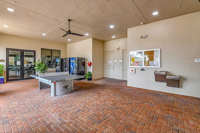 interior space featuring ceiling fan