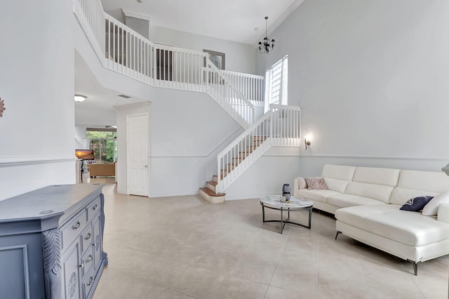 living room featuring light tile patterned floors and a high ceiling