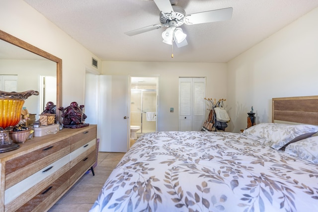 bedroom with connected bathroom, ceiling fan, a textured ceiling, a closet, and light wood-type flooring