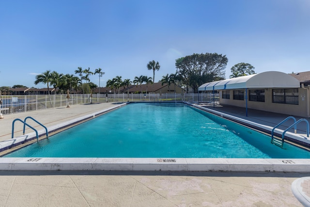 view of pool featuring a patio