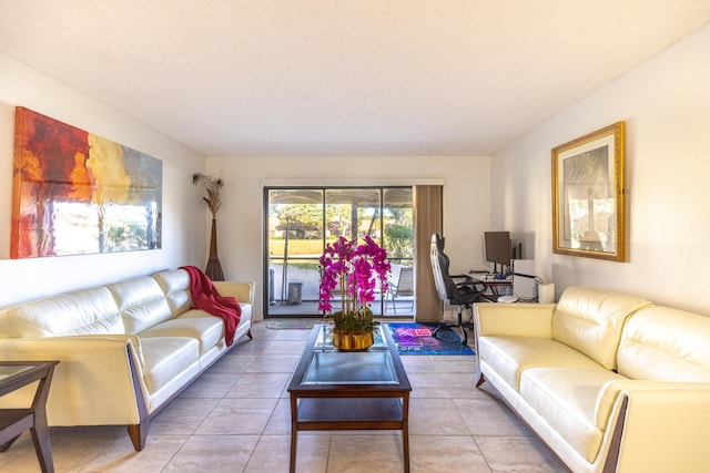 tiled living room with a textured ceiling