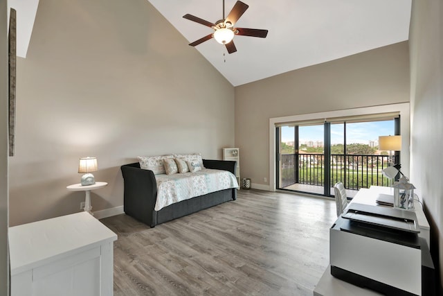 bedroom featuring high vaulted ceiling, ceiling fan, access to outside, and light wood-type flooring