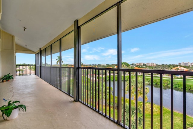 balcony featuring a water view