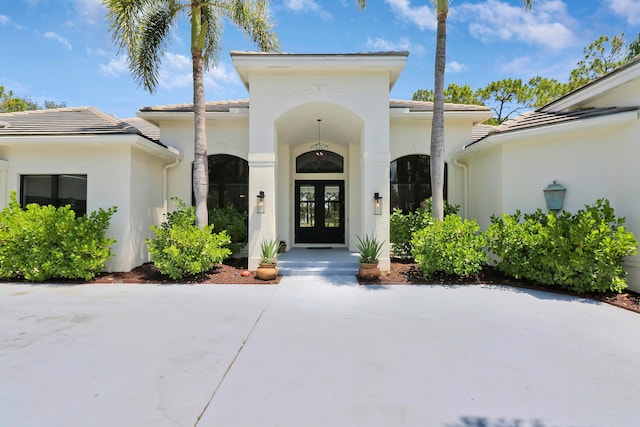 doorway to property featuring french doors